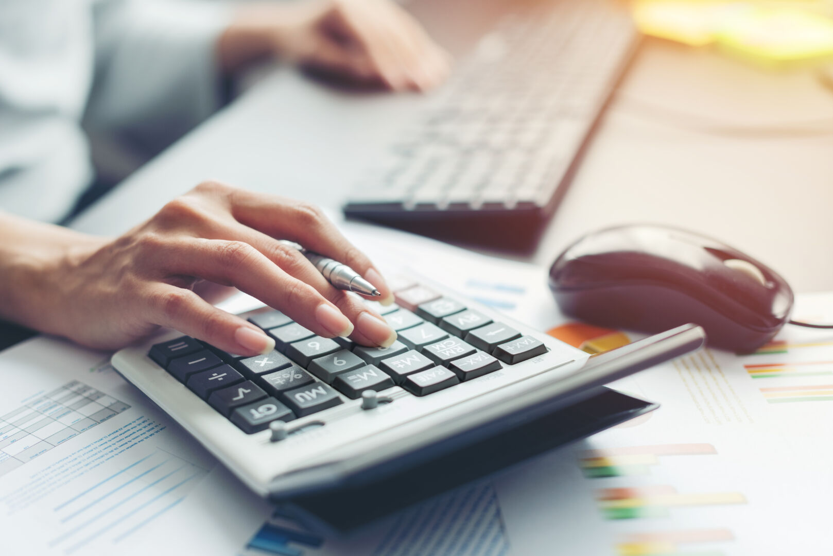hand of business woman accountant or banker making calculations. Services iStock 1177540747